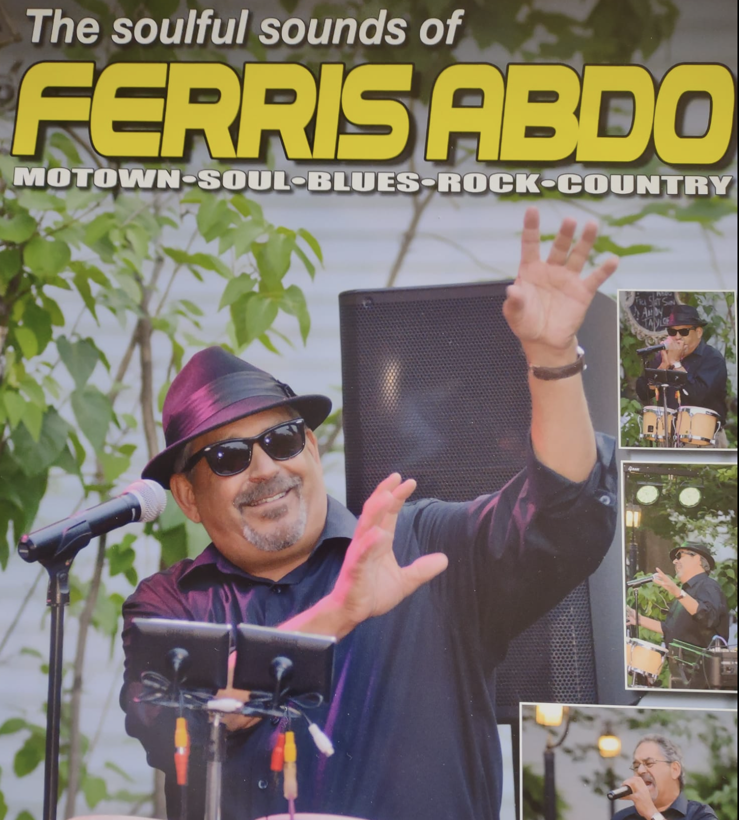 man playing music in hat 